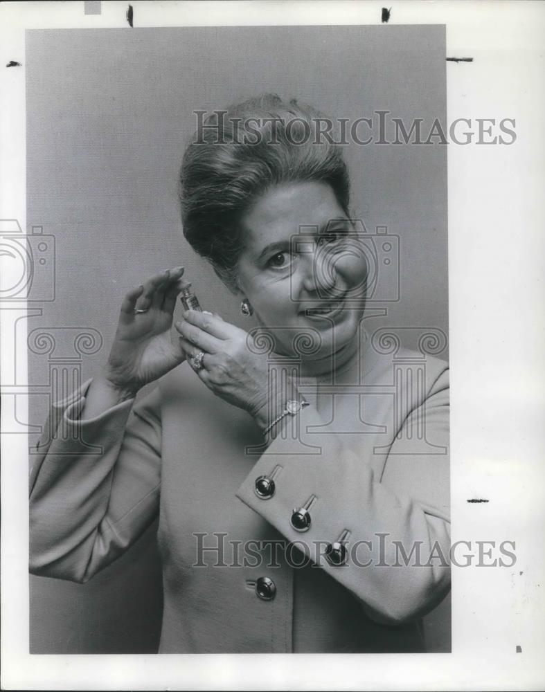1969 Press Photo Mrs. Jack W. Dowsett tries on Balenciaga perfume - ora20114 - Historic Images