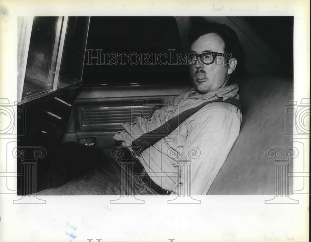 1980 Press Photo Dennis W. Delvin, arrested by police for public intoxication - Historic Images