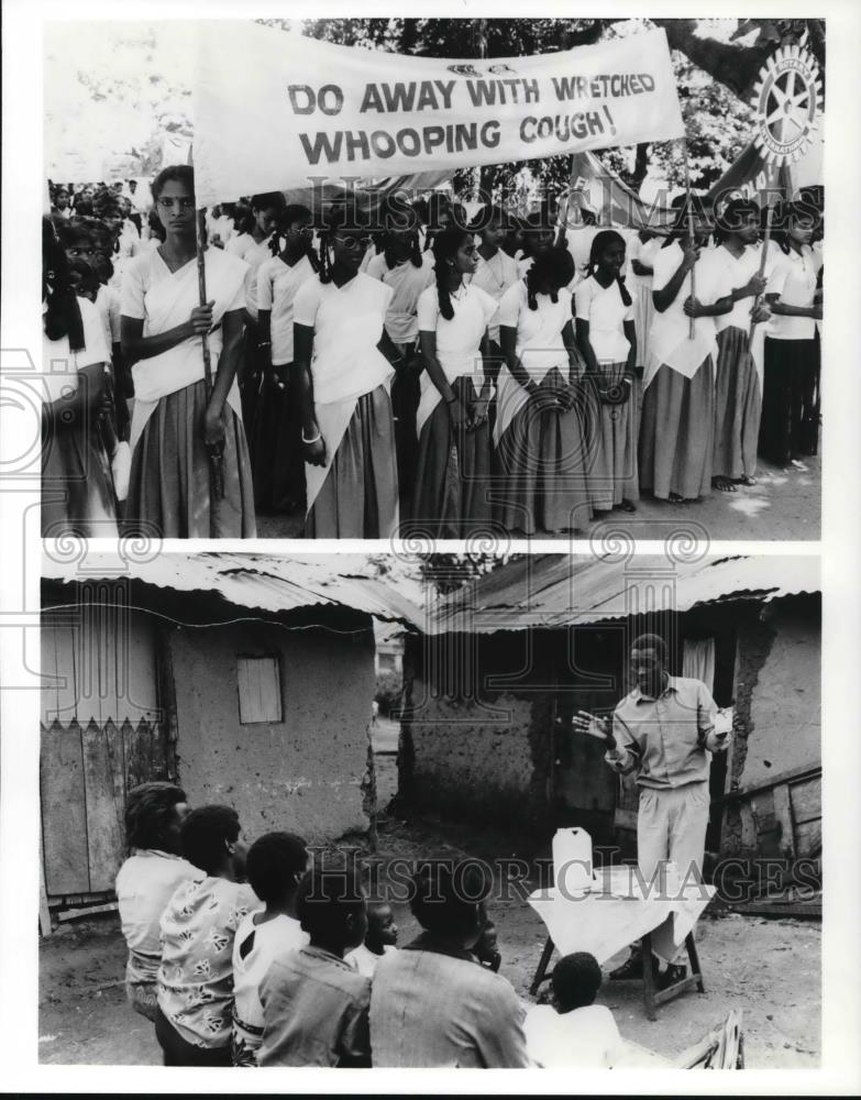 1991 Press Photo Mike Kiiza in Kampala Uganda and Women in Madras India - Historic Images