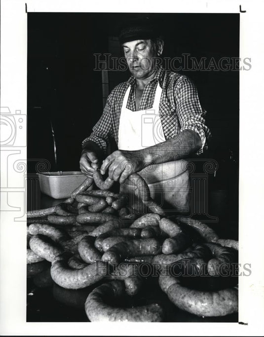 1988 Press Photo Adolph A. Bruec known as a master in sausage making - Historic Images