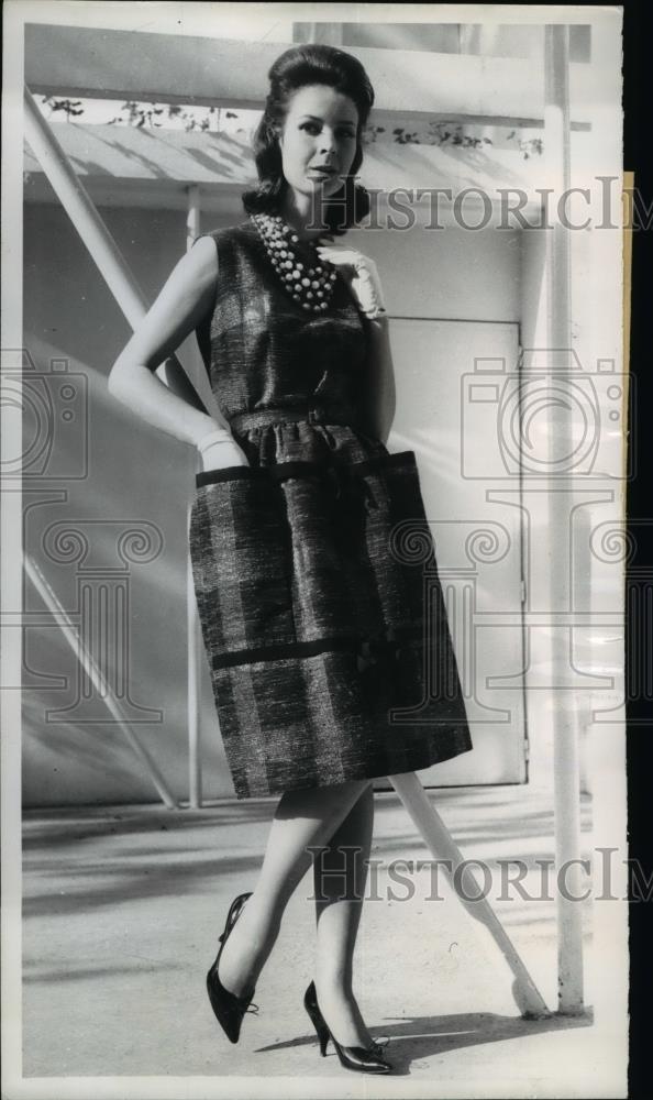 1960 Press Photo of a model wearing the latest fashion in Paris. - ned94901 - Historic Images