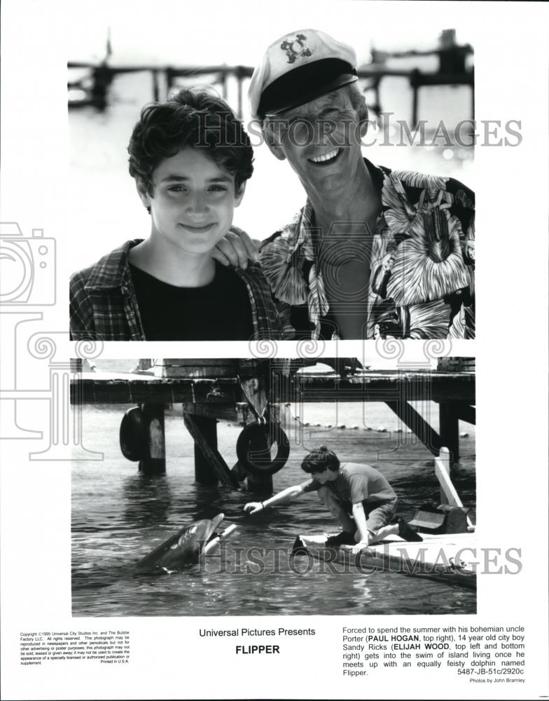 1996 Press Photo Paul Hogan, Elijah Wood in Flipper - cvp42032 - Historic Images
