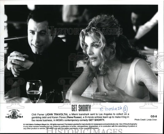 1995 Press Photo John Travolta and Rene Russo in "Get Shorty" - cvp42946 - Historic Images