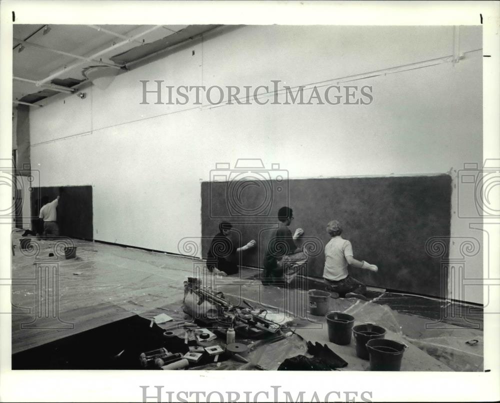 1990 Press Photo The three artists paint the wall to start their art work - Historic Images