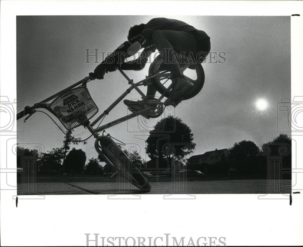 Press Photo The bicycle stunt - Historic Images