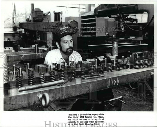 1983 Press Photo Gary Frigh checks out a die at the Die Natic Corporation - Historic Images