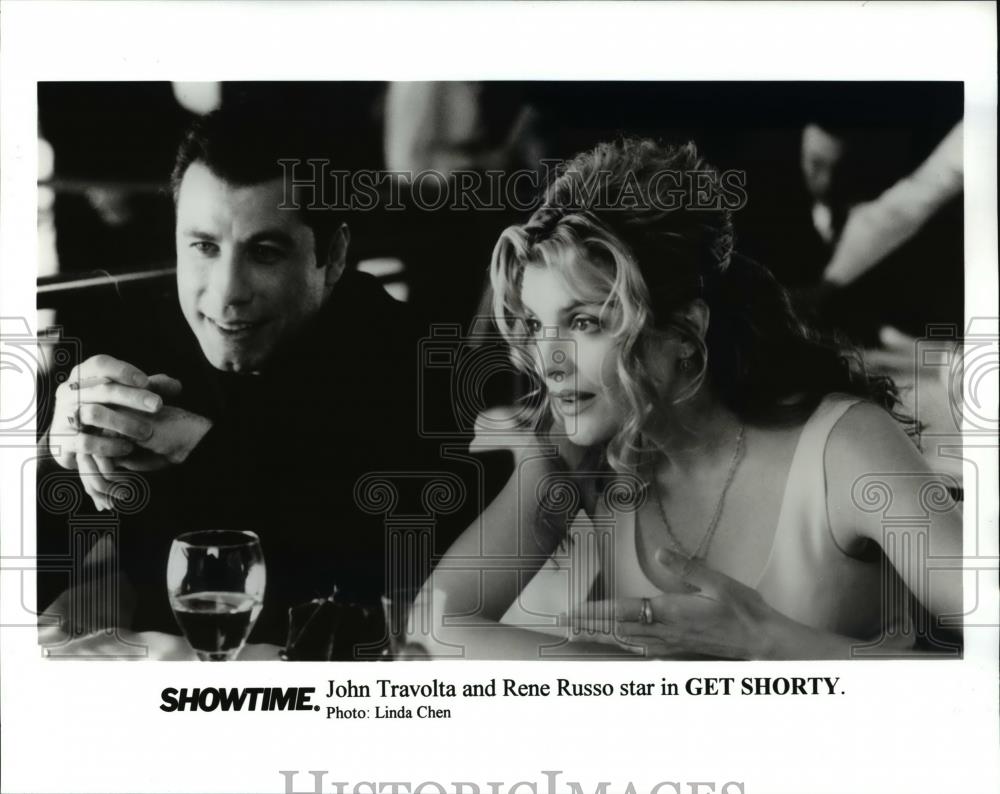 1997 Press Photo John Travolta and Rene Russo in &quot;Get Shorty&quot; - cvp44722 - Historic Images