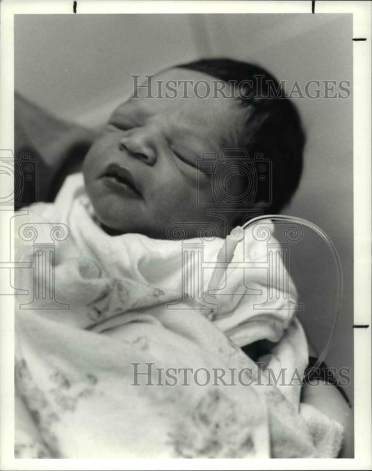 1991 Press Photo Abandones baby at the Hough Branch Library - Historic Images