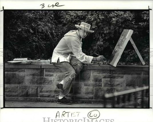 1987 Press Photo Todd Mueller works on a landscape painting - cva59001 - Historic Images