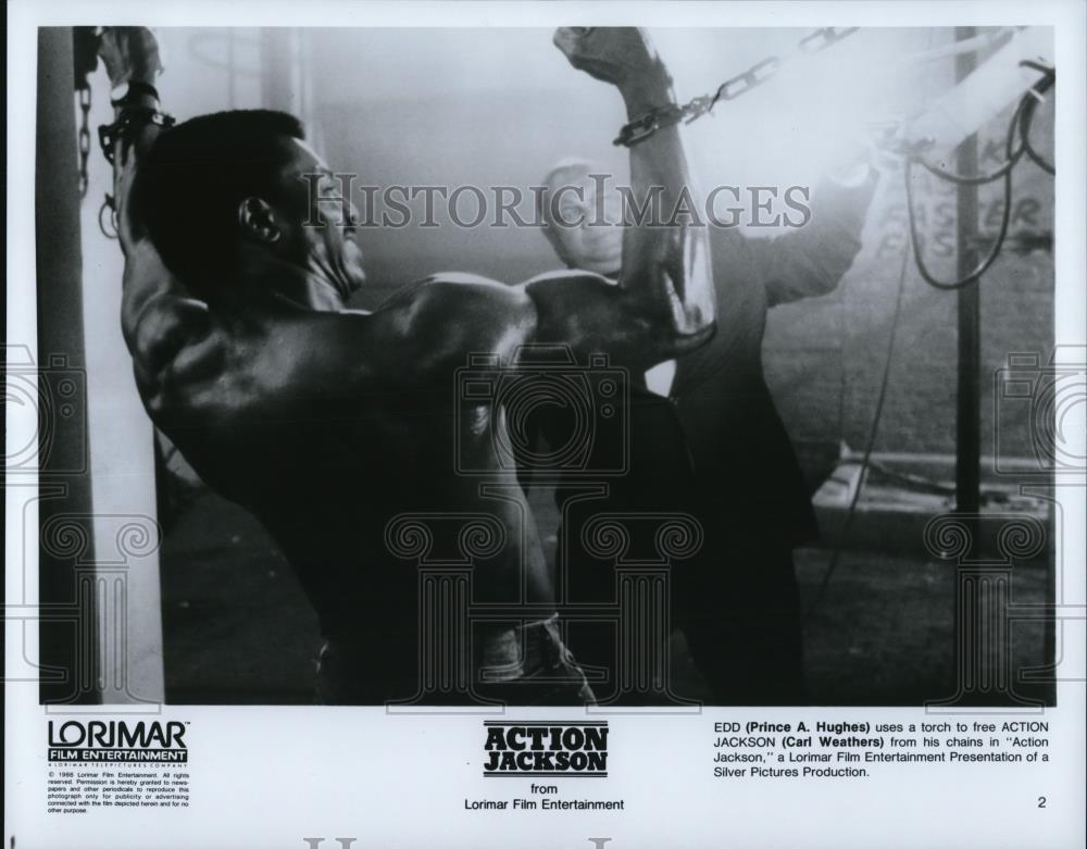 1988 Press Photo Prince Hughes and Carl Weathers in Action Jackson - Historic Images