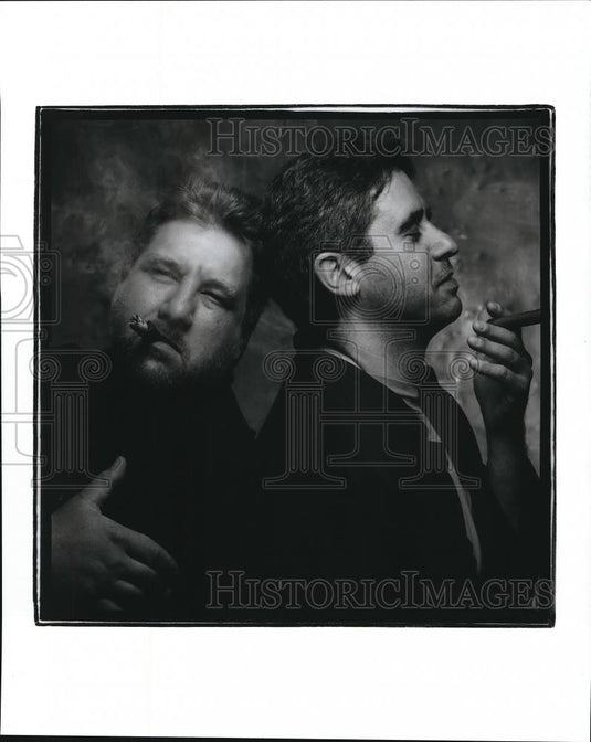 Press Photo Two guys smoking cigars - Historic Images