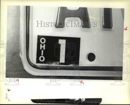 1979 Press Photo 1980 License sticker renewal for January - Historic Images