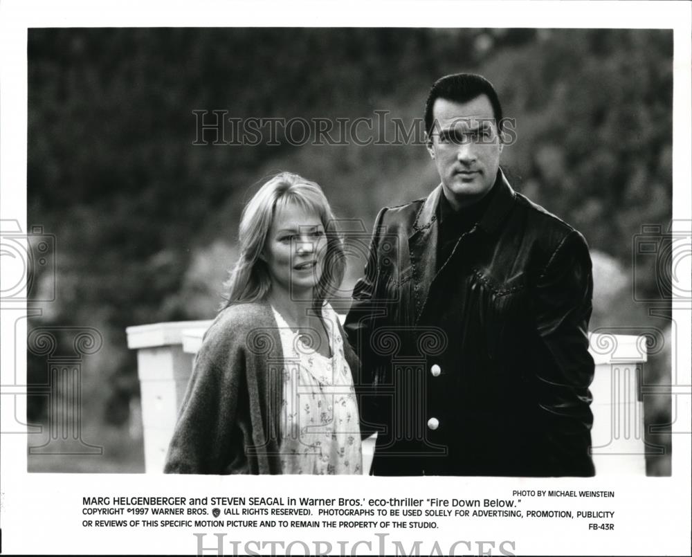 1997 Press Photo Marg Helgenberger and Steven Seagal in Fire Down Below - Historic Images