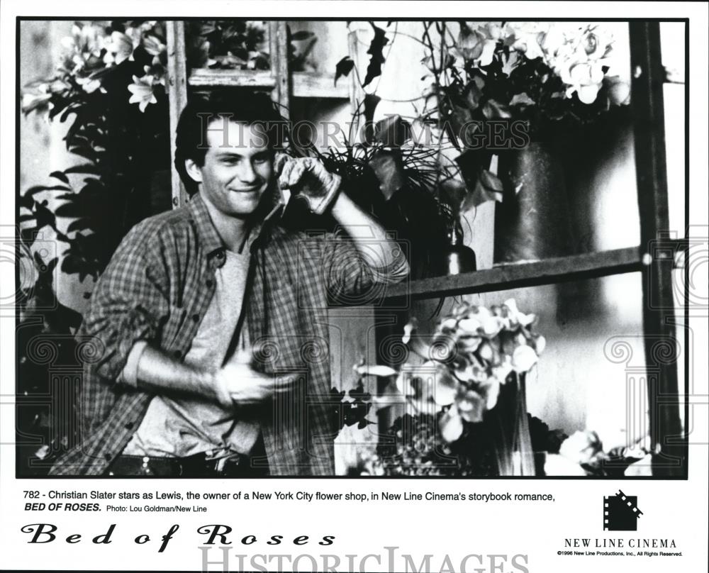 1996 Press Photo Christian Slater in Bed of Roses - cvp56442 - Historic Images