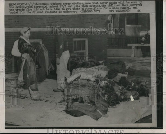 1958 Press Photo Children's Clothing Pile After School Fire, Chicago - Historic Images