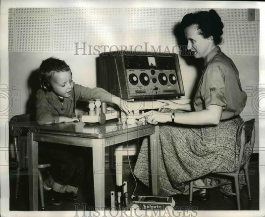 1957 Press Photo Film "Reach Into Silence" about hearing correction, Chicago Il. - Historic Images