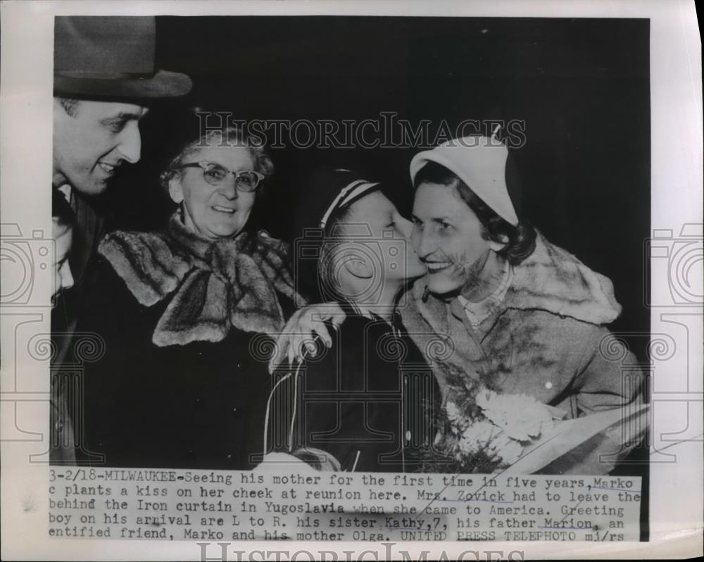 1954 Press Photo of Marko Zovick kissing his mother after she had to flee - Historic Images