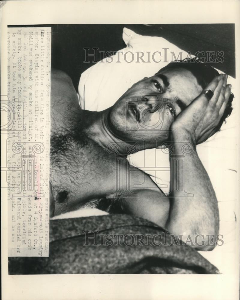 1948 Press Photo Roland Neill Recovers from Smoke Inhalation After New York Fire - Historic Images