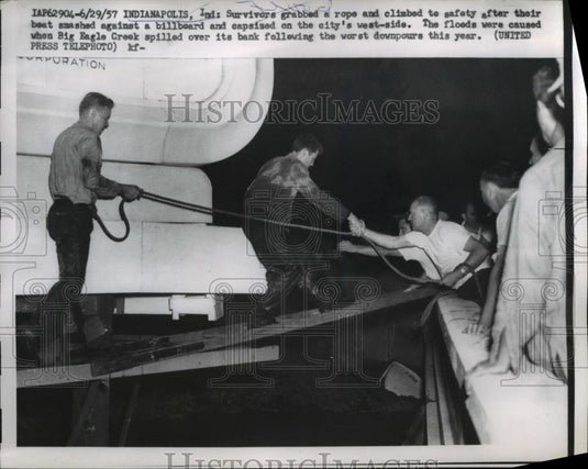 1957 Press Photo Survivors Grab Rope & Climb to Safety Indianapolis Floods - Historic Images