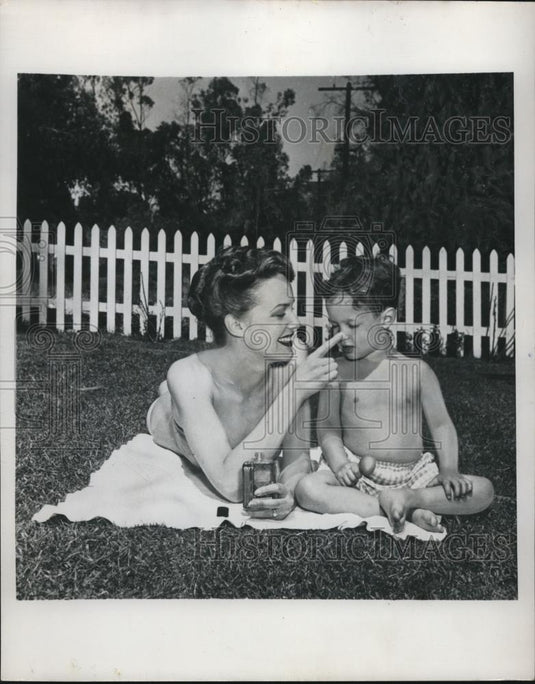 1950 Press Photo Sunburn Prevention Used on Child - Historic Images