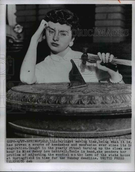 1956 Press Photo Springfield Ill Nancy Lou Lutterell & yard sun dial - Historic Images