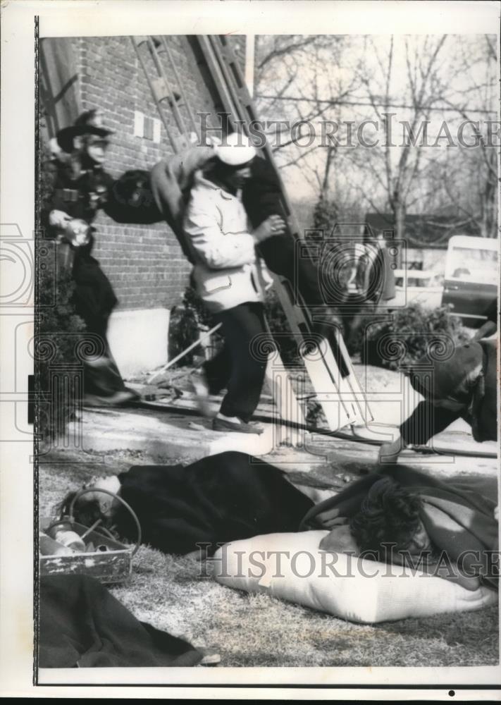 1963 Press Photo Bellport NY Jr & Sr HS fire & victims being treated - nee13083 - Historic Images