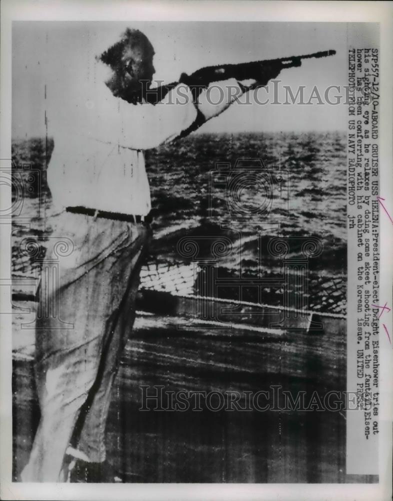 1953 Press Photo President Elect Dwight Eisenhower on USS Helena Firing Gun - Historic Images