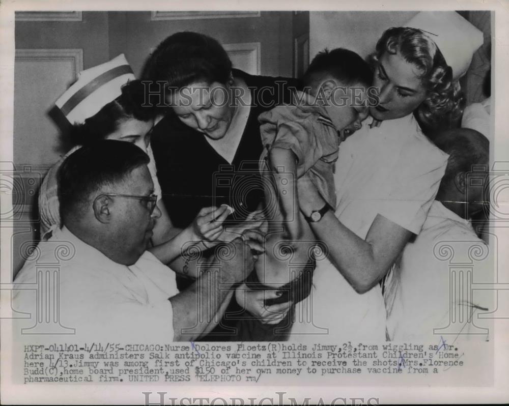 1955 Press Photo Nurse Dolores Ploetz holds little Jimmy while Dr. Kraus injects - Historic Images