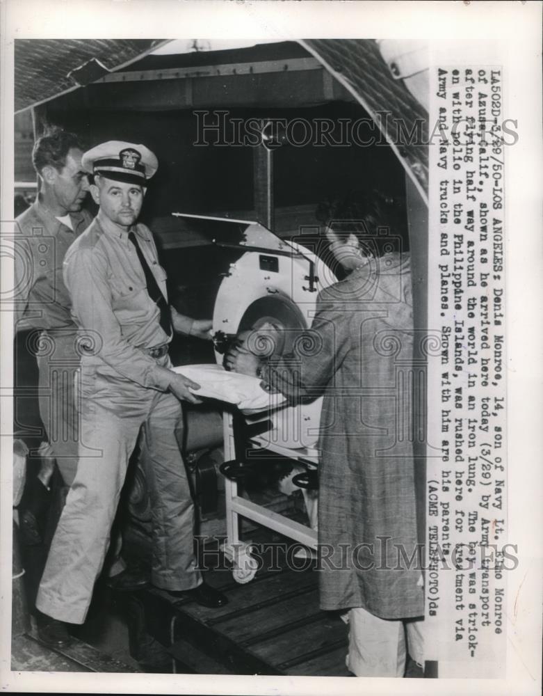 1950 Press Photo Denis Monroe with an iron lung - Historic Images