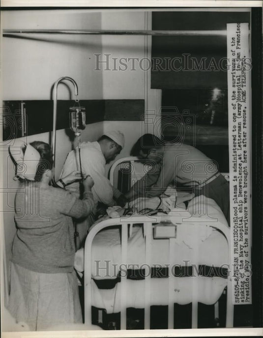 1950 Press Photo The blood plasma administered to a survivor of the Navy ship - Historic Images