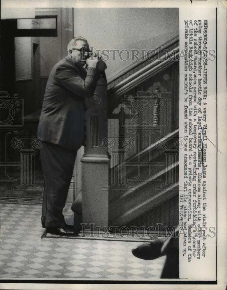 1958 Press Photo Virgil Blossom was seen weary as he leans at a stair post - Historic Images