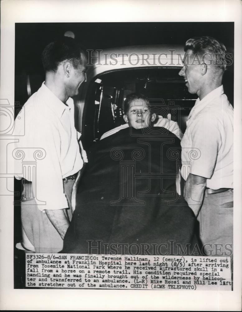 1949 Press Photo Terence Hallinan,lifted out of ambulance from Franklin Hospital - Historic Images