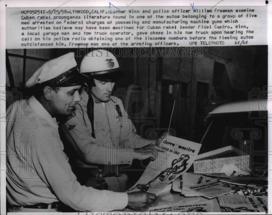 1958 Press Photo Luther Winn & Police Officer William Freeman Cuban Propaganda - Historic Images