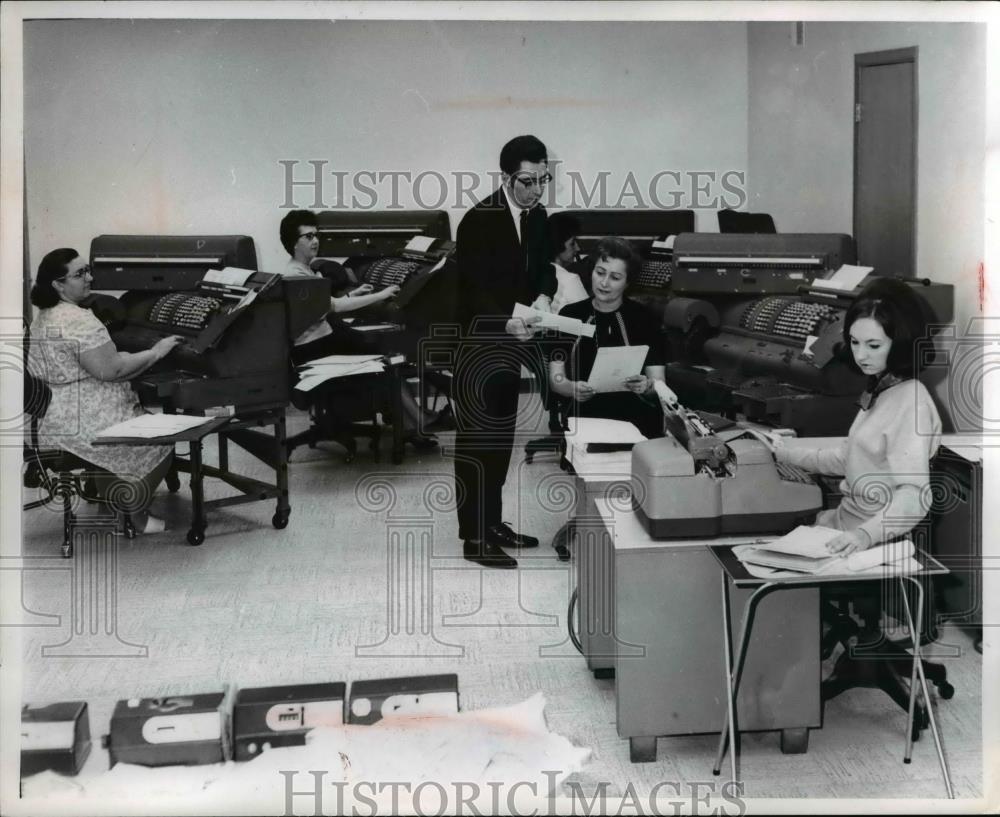 Press Photo Len Marshall Shows Ann Later Work About Payroll Tax - Historic Images