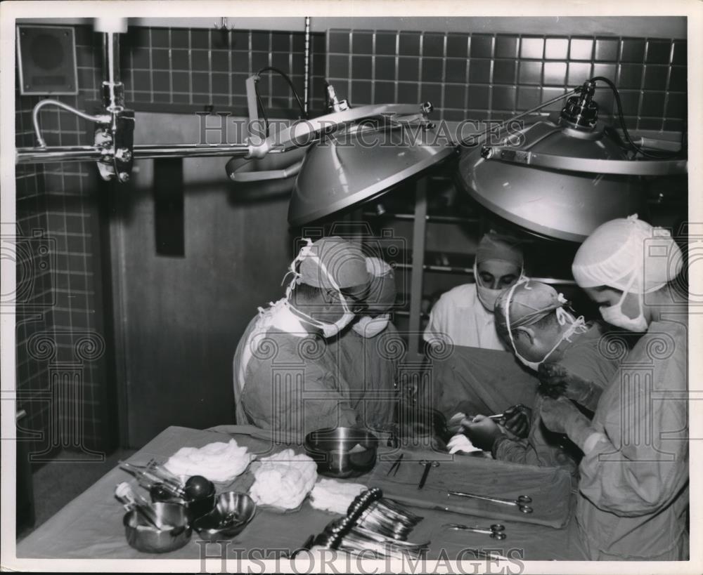 Press Photo Doctors J. Diler, B. DiLeo, J Knight Jr, and Miss Donne Adamens. - Historic Images