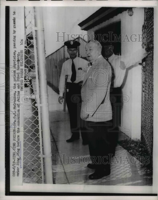 1953 Press Photo Dr. G.K. McCracken is escorted by the guards - Historic Images