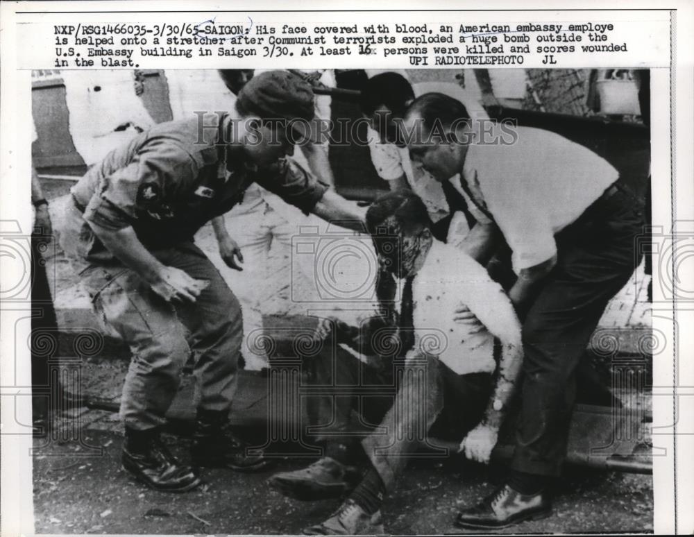 1965 Press Photo American embassy employees face bloody,  bomb outside embassy - Historic Images