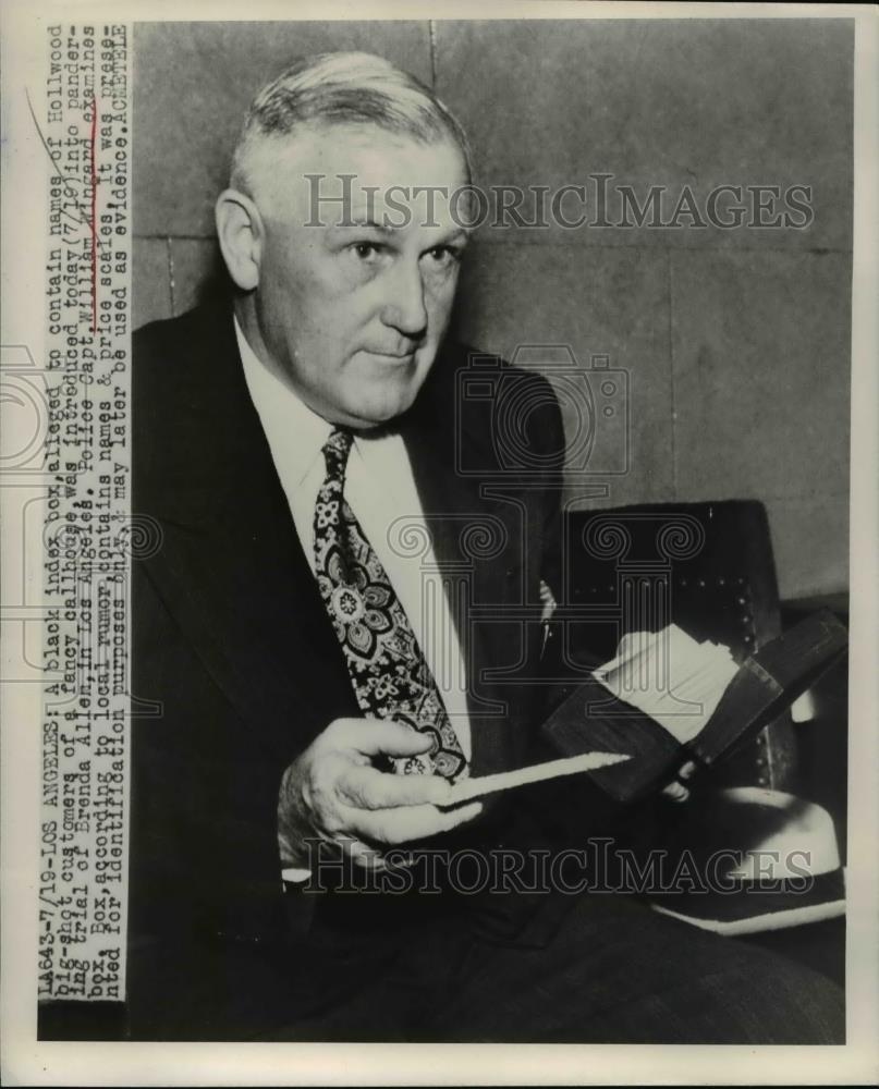 1948 Press Photo Police Capt.William Wingard Examines Box - Historic Images