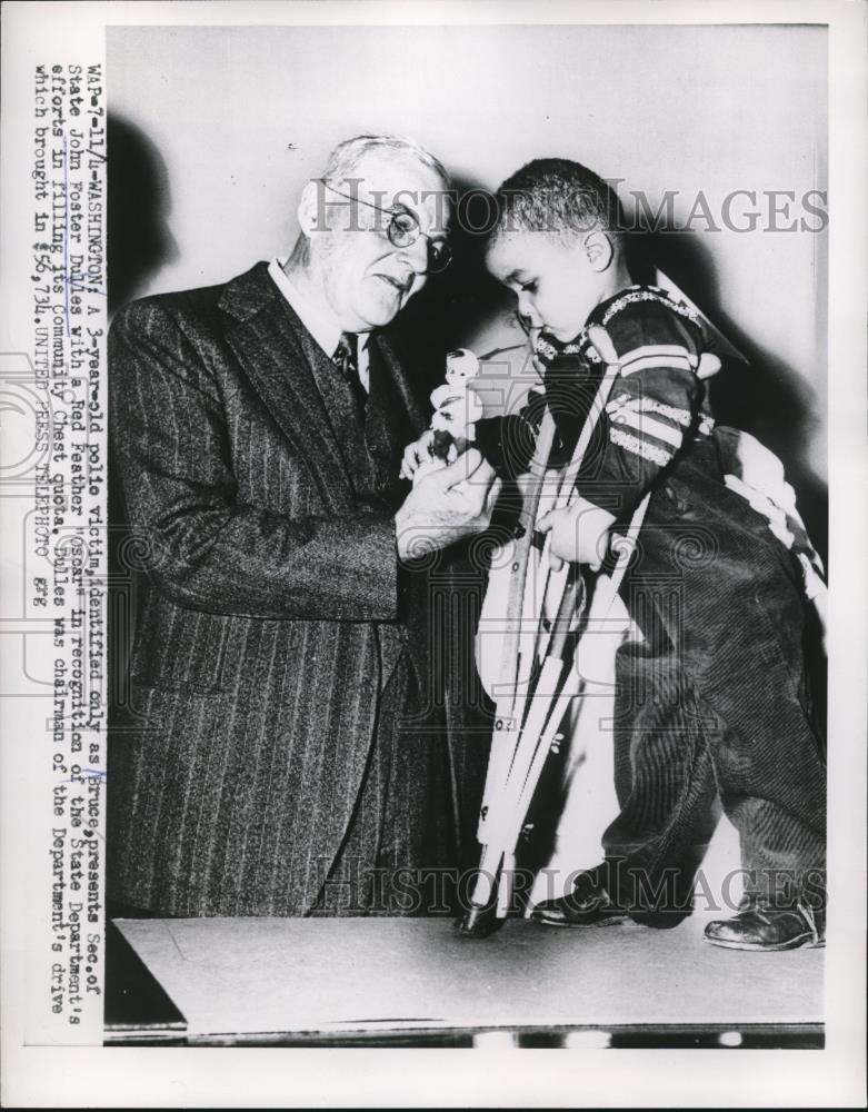 1953 Press Photo Polio victim Bruce Presents John Foster Dulles with Red Feather - Historic Images