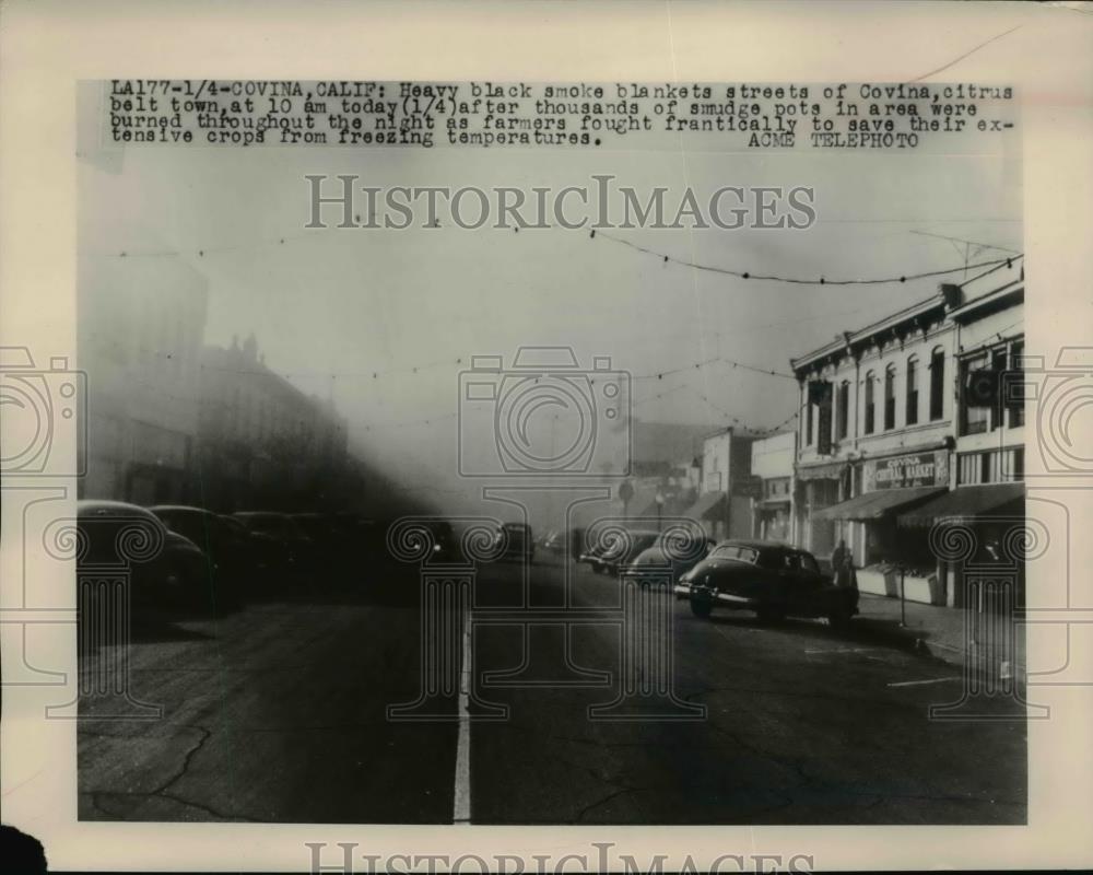 1949 Press Photo Pots Burned to Save Freezing Crops in Covina CA - Historic Images