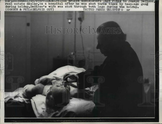 1957 Press Photo Priest Administers Last Rites to Joseph DeCicco After Shot - Historic Images
