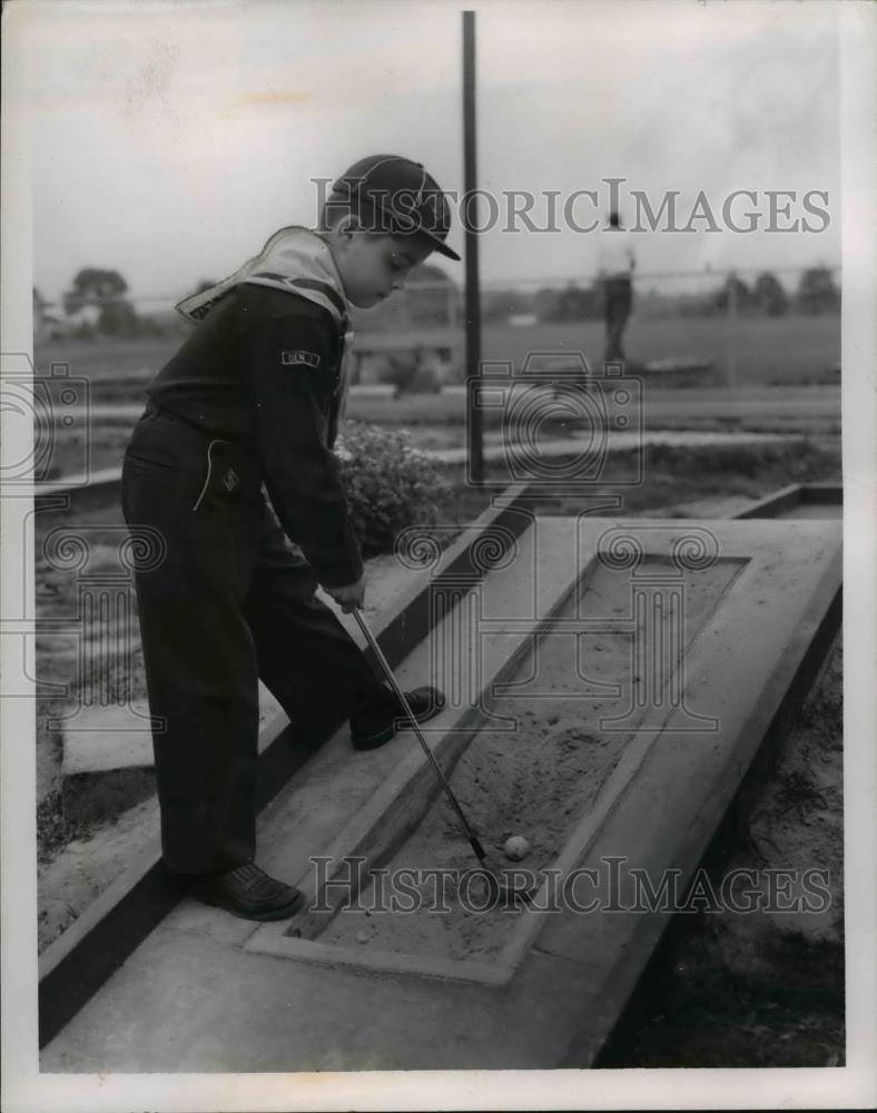 1955 Press Photo Dennis Brostek Boy Scout Playing Miniature Golf - nee31886 - Historic Images