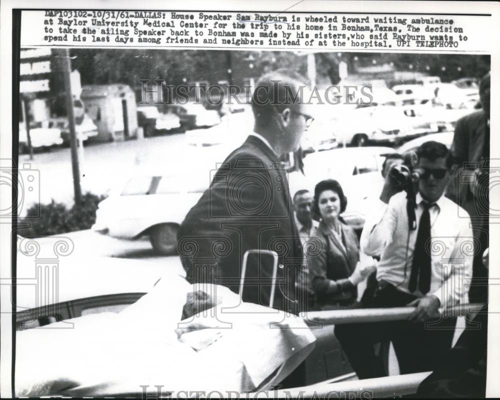 1961 Press Photo House Speaker Sam Rayburn wheeled toward waiting ambulance - Historic Images