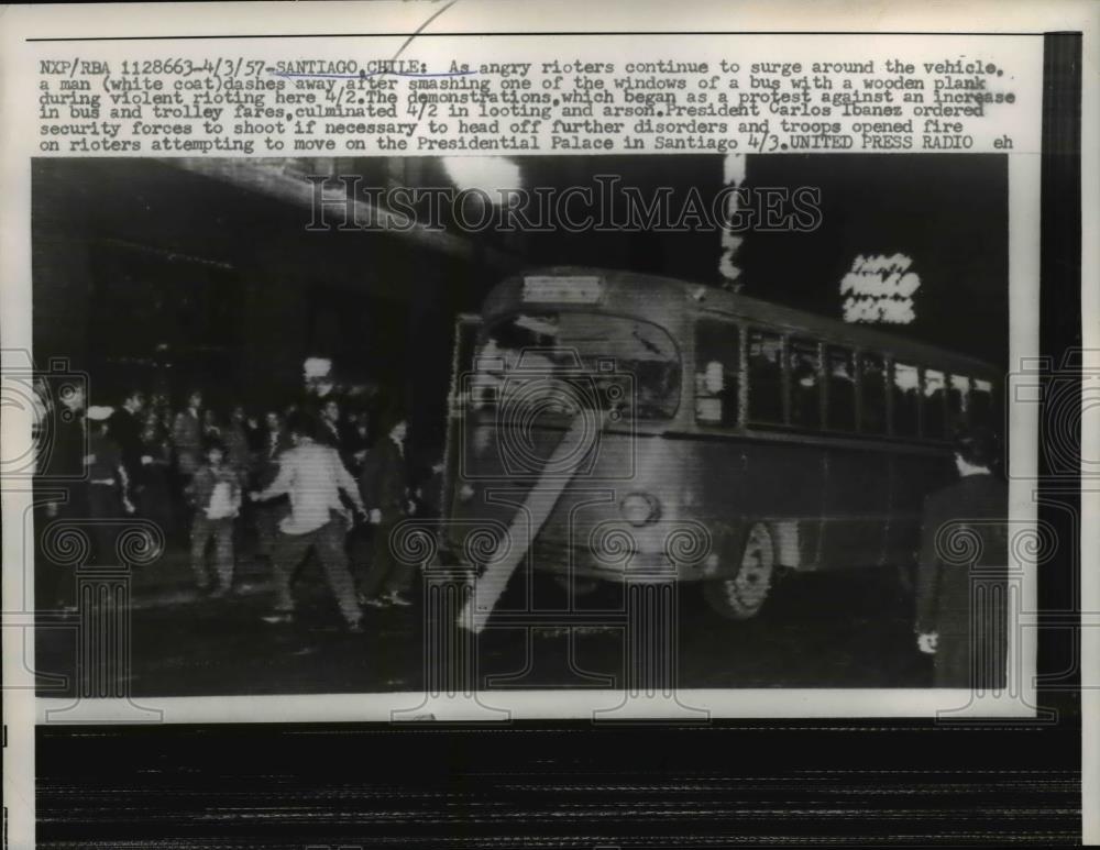 1957 Press Photo Rioters Smash Bus During Transportation Strike, Santiago Chile - Historic Images