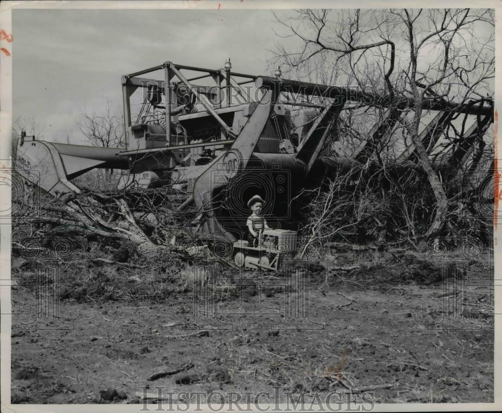 1951 Press Photo Stevie Cavazos plays with toy tractor - Historic Images