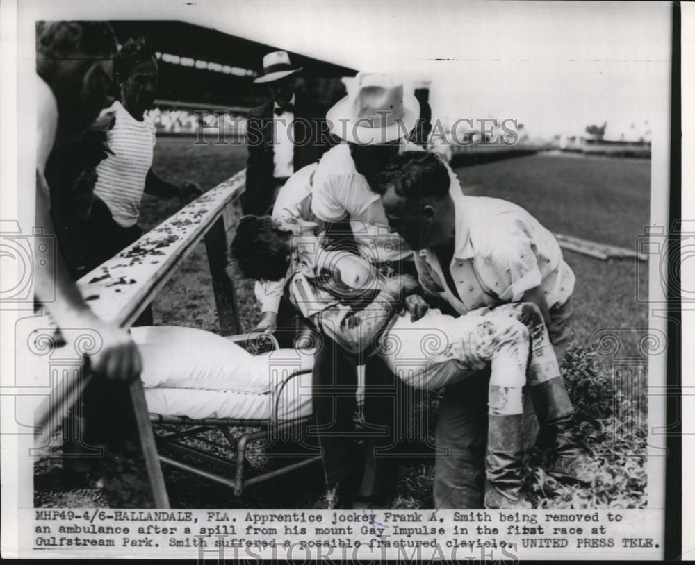 1954 Press Photo Frank A. Smith removed to ambulance after fractured clavicle - Historic Images