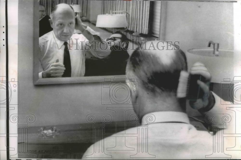 1962 Press Photo Sen. Jacob K. Javits Brushes his Hair - Historic Images