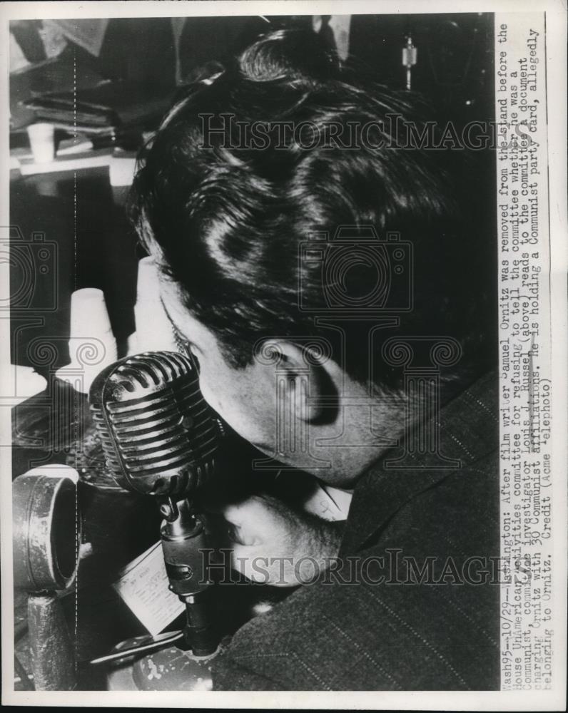 1947 Press Photo Louis Russel reads to the committee a document of affliations - Historic Images