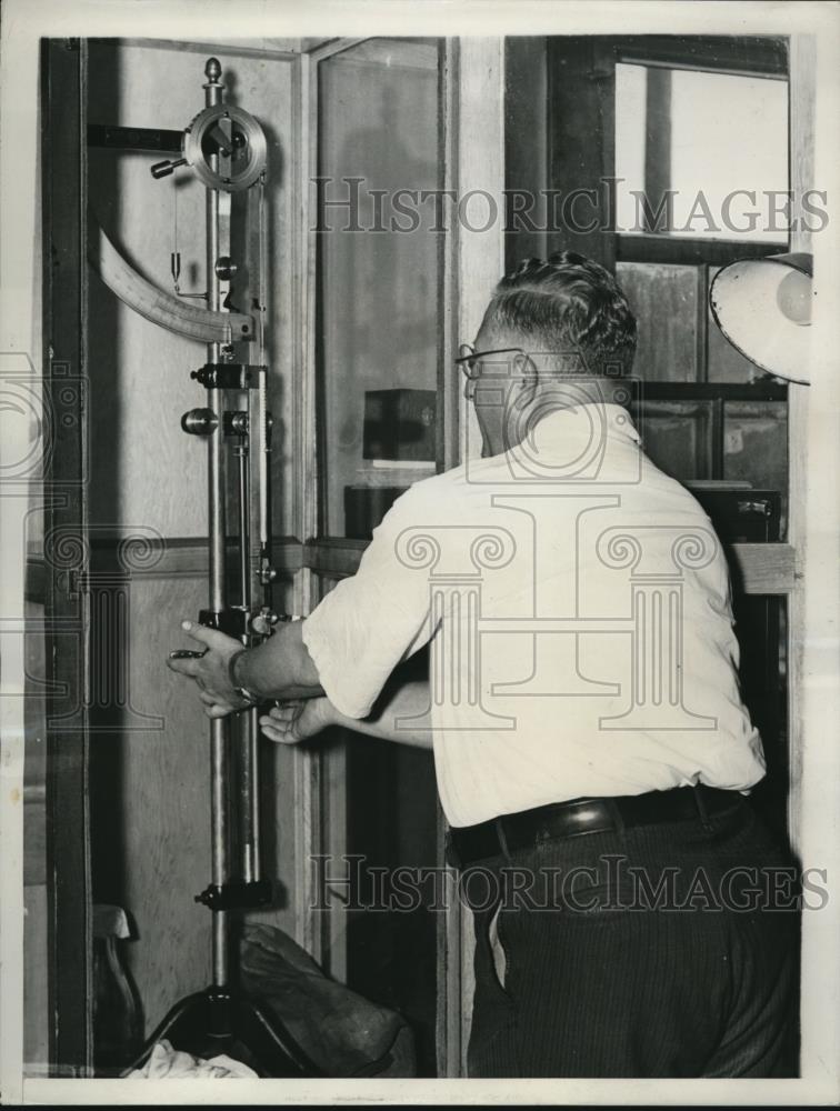 1937 Press Photo Dr. Joseph Caspe with the delicate machine - Historic Images