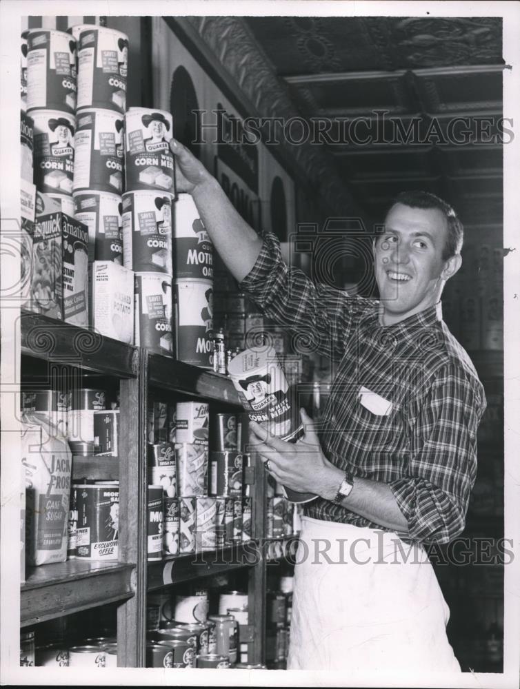 1960 Press Photo Food Worker Steve Jankowski Stocking Shelves - nee27714 - Historic Images